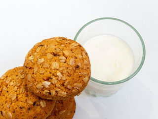 Homemade oatmeal cookies and milk