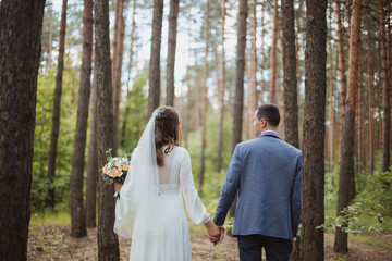 a walk in the forest of two newlyweds