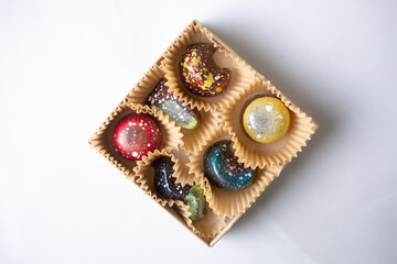 Modern colorful bonbon chocolates in a box