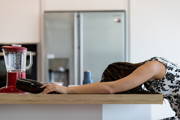 Face-down woman, empty wine bottle, deplorable sight, addiction