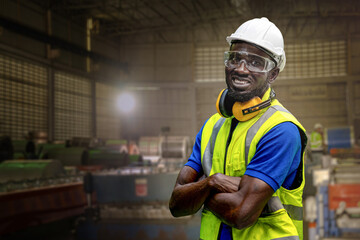 Portrait of manual African man worker is standing with confident with working suite dress and...