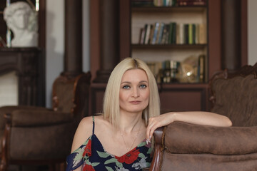 Fototapeta premium portrait of a young woman in the home interior