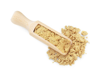 Wooden scoop with aromatic mustard powder on white background, top view