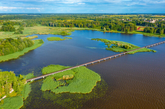 Wooden bridge over Sirvenos lake in Birzai, Lithuania