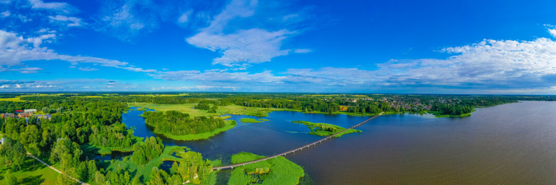 Wooden bridge over Sirvenos lake in Birzai, Lithuania