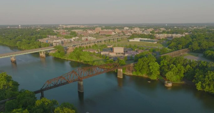 Aerial Panning Shot Of Famous Black Warrior Railroad Bridge In City On Sunny Day - Tuscaloosa, Alabama