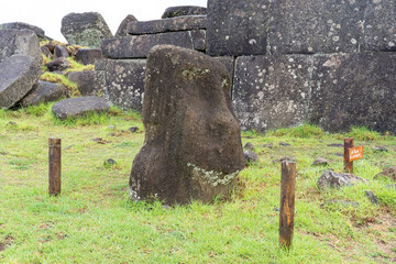 Easter Island, Chile - February 28, 2023: The walls with stone blocks were constructed and polished for a perfect fit at Ahu Tahira in Vinapu Archaeological Complex, Easter Island (Rapa Nui), Chile.