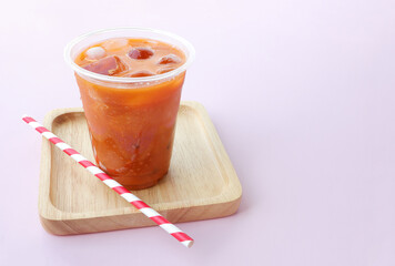 Thai Milk Tea or Milk ice tea, A glass of ice milk tea. It is popular in Thailand and is served in many restaurants. Iced tea (called Cha Yen in Thailand)