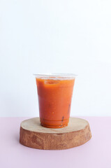 Thai Milk Tea or Milk ice tea, A glass of ice milk tea. It is popular in Thailand and is served in many restaurants. Iced tea (called Cha Yen in Thailand)