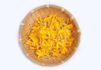 petals of fresh marigold in basket on white background. Top view. 