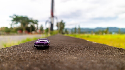 minahasa, Indonesia : January 2023, toy car in the rice field