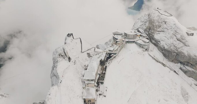 Mountain Pilatus and Lake Lucerne in Winter Morning. Tourists on Viewpoint. Swiss Alps, Switzerland. Aerial View. Drone mountain peak. Mountain Pilatus  Switzerland.