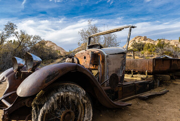 Fototapeta na wymiar Old Abandoned Truck at The Wall Street Mill, Joshua Tree National Park, California, USA