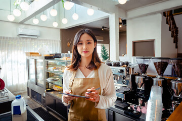 Fototapeta na wymiar female coffee shop owner