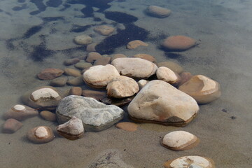Fototapeta na wymiar stones on the beach, Jasper National Park, Alberta