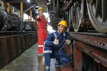 Engineer train Inspect the train's diesel engine, railway  track in depot of train