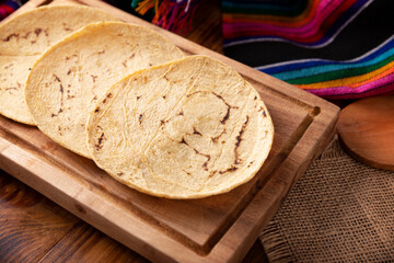 Corn Tortillas. Food made with nixtamalized corn, a staple food in several American countries, an essential element in many Latin American dishes.