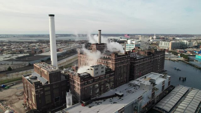 Factory with USA flag, industrial production and shipping. Baltimore, MD