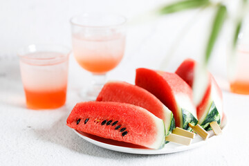 Watermelon slices with stick.