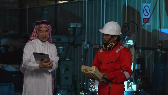 Sheikh contacted to negotiate the business of automatic welding robots in smart automotive factories with industry 4.0 digital manufacturing operation system software monitoring.