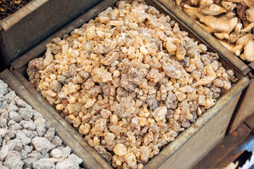 Various incense and incense material in iron boxes on the market