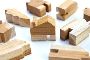 Mini wood house model on white background.