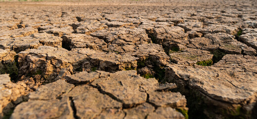 Dry water crisis deep cracks land symbolize hot weather and drought.