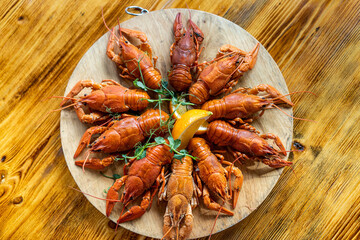 River boiled crayfish. Red cooked crayfish. Plate with crayfish.