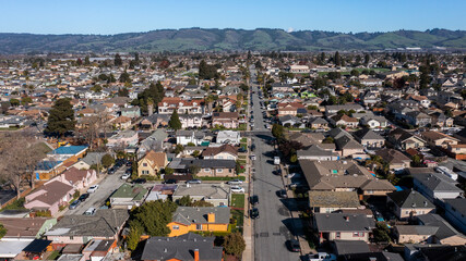 Watsonville, California, USA - January 1, 2023: Sun shines on a residential neighborhood near downtown Watsonville. - obrazy, fototapety, plakaty