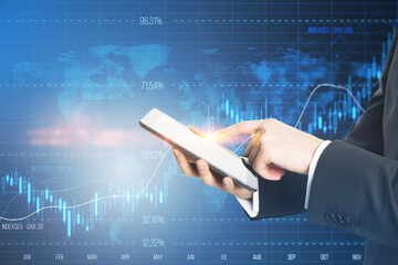 Close up of businessman hand pointing at mobile phone with glowing candlestick forex chart with index on blurry blue background. Trade, stock and finance concept. Double exposure.