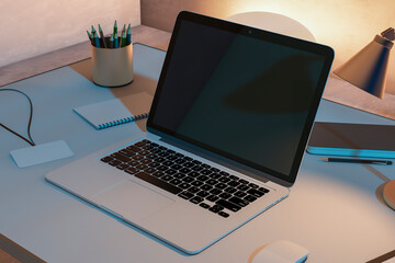 Close up of bright designer desktop with blank laptop screen and supplies. Mock up, 3D Rendering. Workplace design concept.