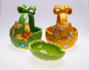 Colorful ceramic Easter decorations with butterfly motifs