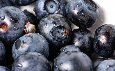 Blueberry fruit in close-up. Ripe fruit, blueberry berries isolated. Background with fruits.