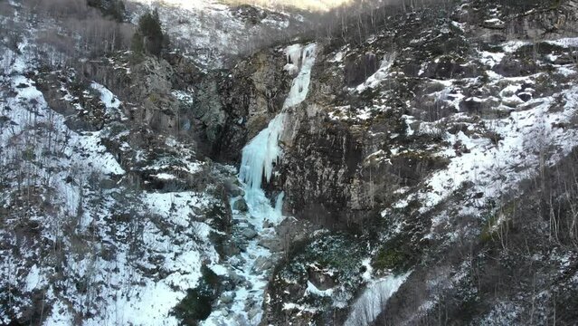 Caucasus, North Ossetia. Digoria Gorge. Frozen waterfall on the river Gebi.
