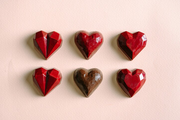 Handmade chocolates and candies on a bright colored background
