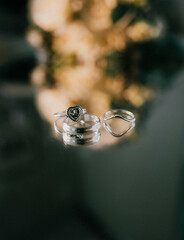 Wedding rings on a mirror