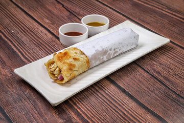 paneer roll with sauce