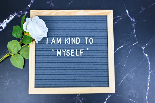 Grey letter board with phrase Self care, I am kind to myself. Self love, Mindfulness lifestyle, mental health. Aspiration, affirmative and supportive sentence