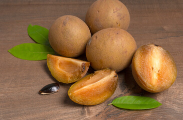 Sapodilla fruit (Manilkara zapota) and other names such as sapota, chikoo, chico, naseberry, or nispero. Sapodilla is tropical fruit evergreen tree and sweet taste fruit