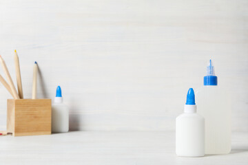 Concept of different office stationery with glue