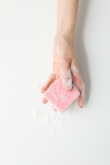 Soap - spa, beauty procedures and skin care concept, top view