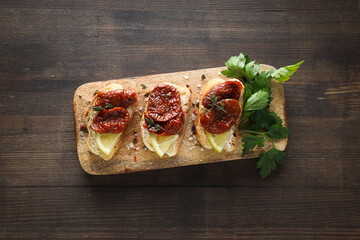 Sandwich with sun-dried tomato - tasty snack concept