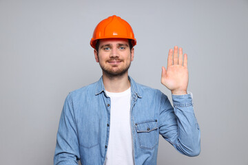 Young man civil engineer in safety hat