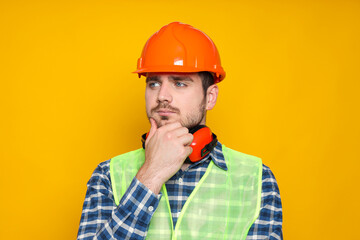 Young man civil engineer in safety hat