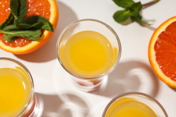 Shot with orange taste, tasty citrus shot concept