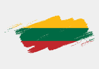 Artistic grunge brush flag of Lithuania isolated on white background. Elegant texture of national country flag