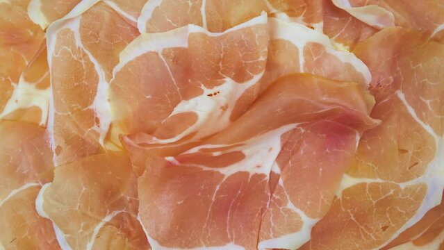 Raw ham. Thinly sliced cured meat. Jinhua ham, dry-cured ham, often called Prosciutto crudo. View from top