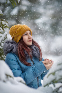 Portrait of a girl in winter in the park
