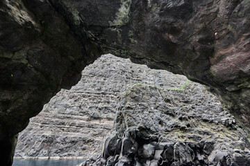 Cliffs and caves in Faroe islands coastline. Vestmanna