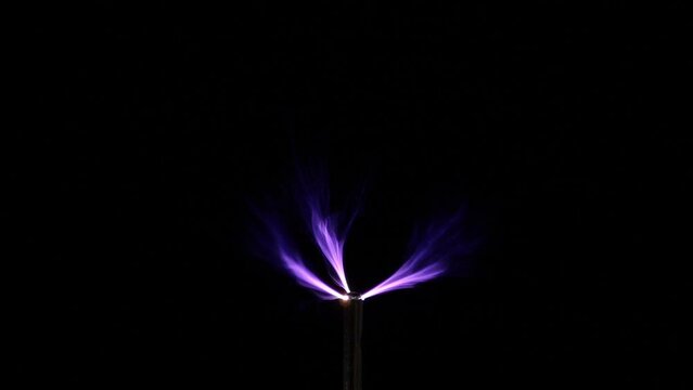 Arc discharge or lightning or Spark - the glow of air ions in an electric field. The effect can be made by a resonant transformer with a high voltage of high frequency. Beautiful scientific effect